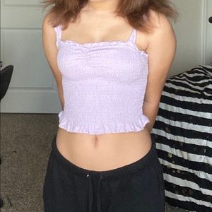 a purple ruffle crop top